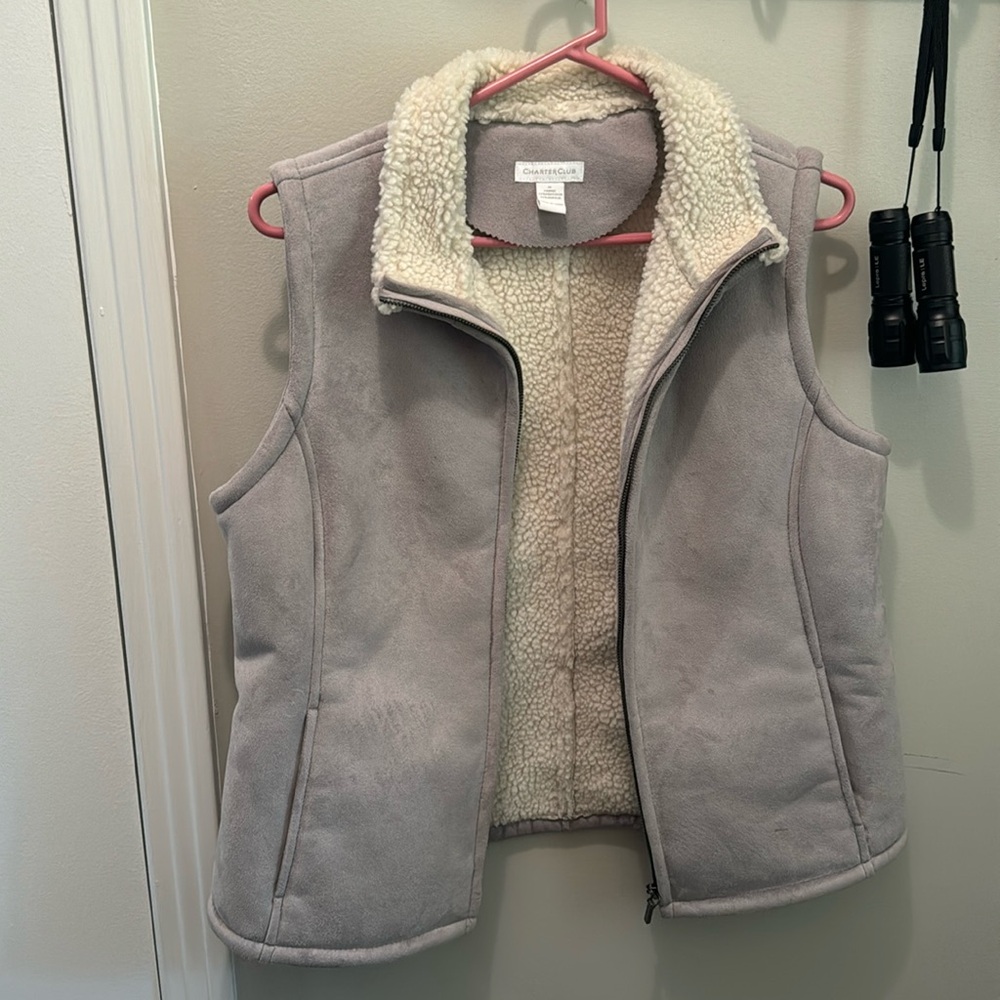 Like gray wool vest never been worn the brand is charter club size medium